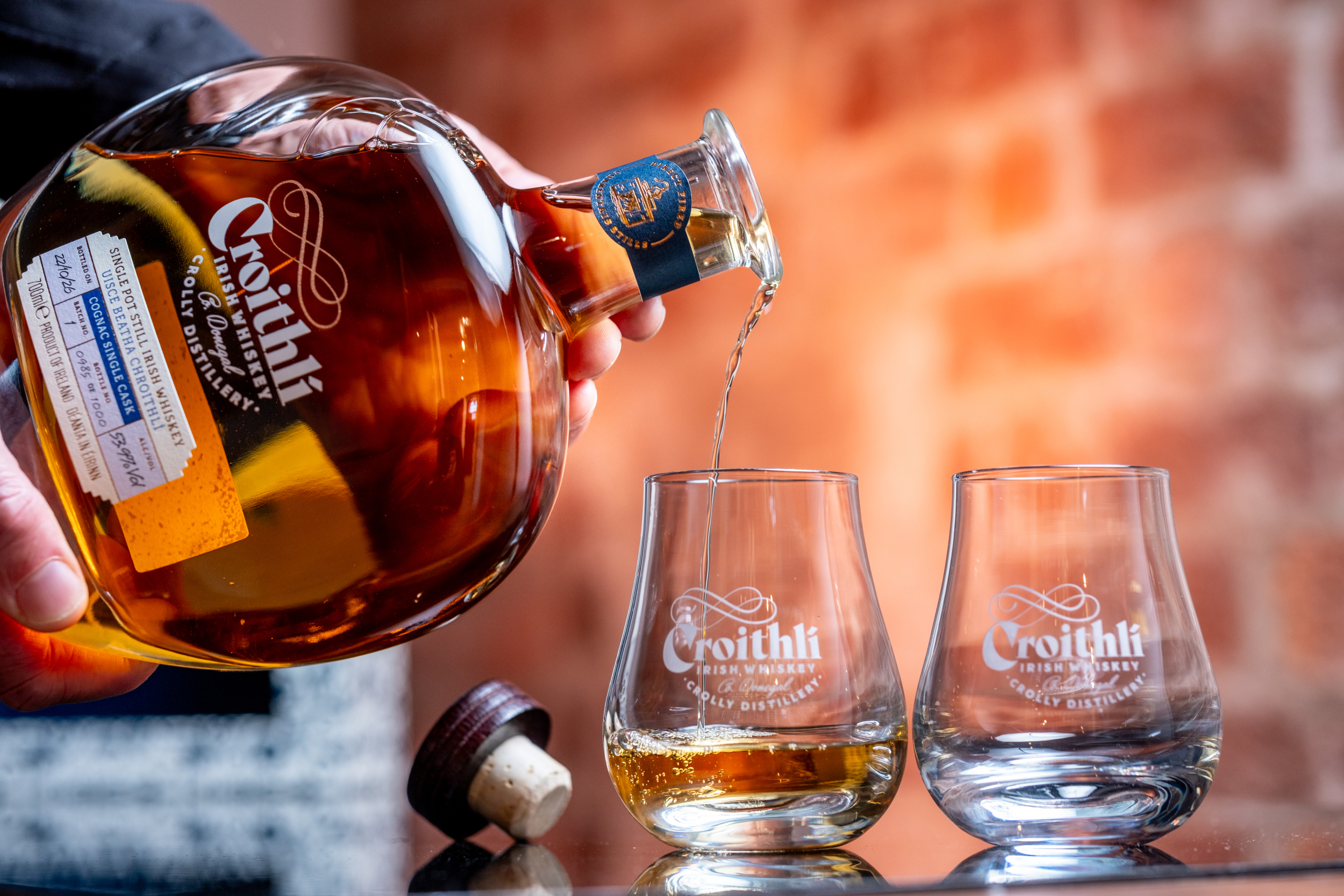 Croithlí Cognac Single Cask single pot still whiskey being poured into a tasting glass